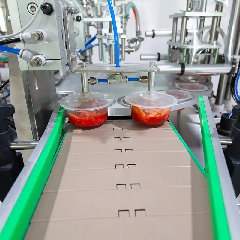 rotary cup filling and sealing machine